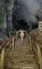 Nude Girl Climbing Stairs in a Cave